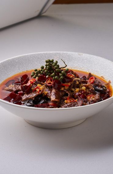 Sliced Taiwanese Beef in Sichuan Spicy Broth with Assorted Vegetables