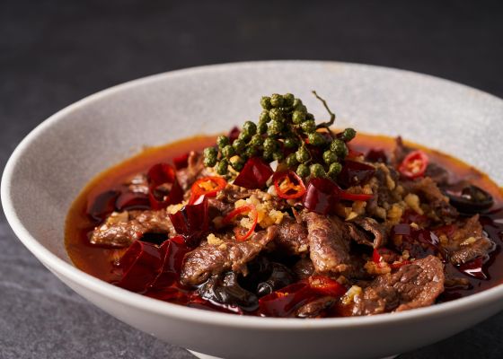 Sliced Taiwanese Beef in Sichuan Spicy Broth with Assorted Vegetables