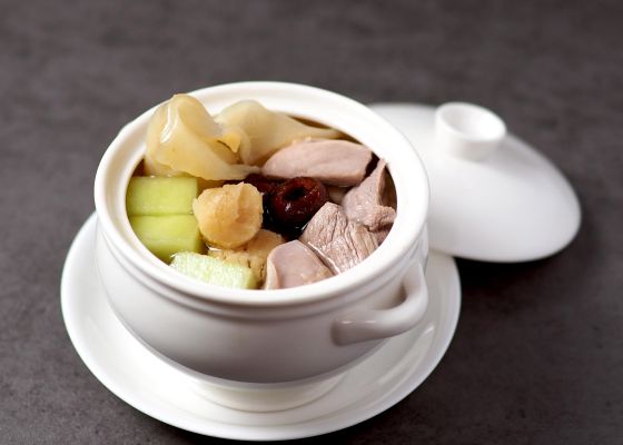 Double-boiled Fish Maw Soup with Honey Dew Melon, Sea Whelks and Conpoy